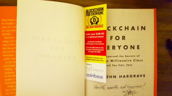 Blockchain for Everyone with a bookmark.